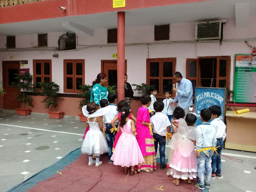 Children Being Appreciated by the Principal